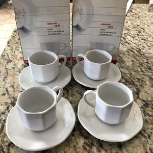 2Cappuccino sets each contain 2 cups and saucers.